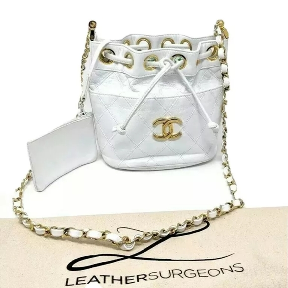 CHANEL Handbags - 🎉HPx3🎉CHANEL White Cosmos mini Drawstring Bag